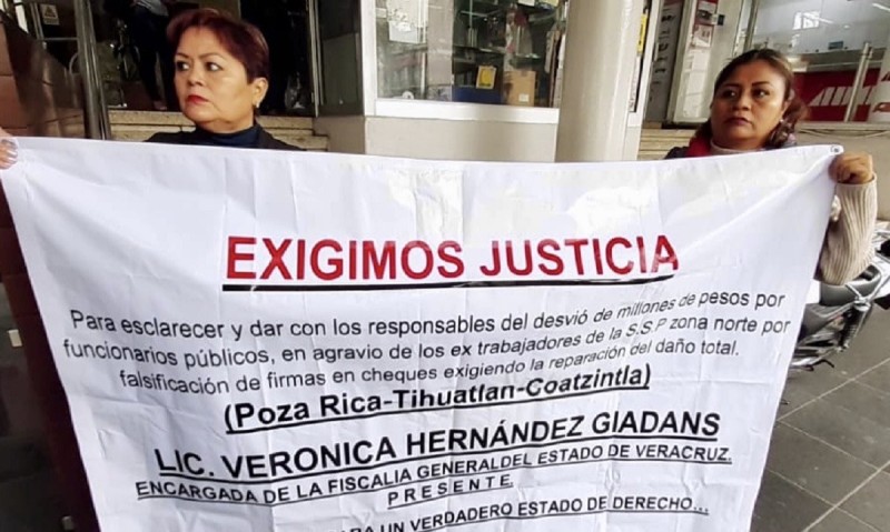 Ex policías exigen justicia a Fiscalía por falsificación de cheques